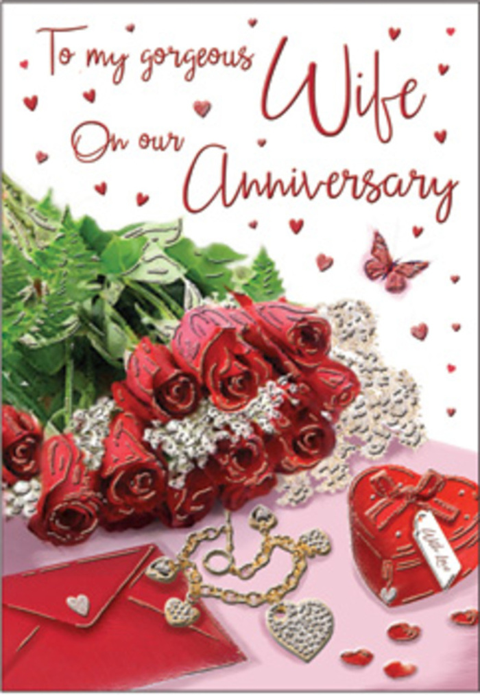 In this romantic anniversary composition, everything is arranged with the unhurried care of someone preparing a surprise at home in Berrylands after a day of work and gentle anticipation. The focal point is a small but striking grouping of red roses, their petals unfolding in plush, velvety spirals that seem to invite a lingering touch. Each bloom is at its perfect stage-fully open yet still fresh-surrounded by sprigs of leafy greenery that arc and curl, lending the arrangement a sense of movement and natural grace. The bouquet appears to rest on a smooth surface, perhaps a dining table set for two, softly lit by diffused daylight that washes across the petals and greenery. To one side, an envelope and matching anniversary card wait to be opened, their pale, creamy paper suggesting quality and care, with cursive writing that hints at words of devotion, gratitude, and shared memories of life in Berrylands-from walks through local parks to quiet evenings at home. Nearby, a heart-shaped keepsake box sits slightly ajar or poised to be opened, its red or metallic finish catching the light. A delicate piece of jewellery lies close by, fine and glimmering, echoing the intimacy of annual traditions and treasured tokens. Scattered across the scene are tiny hearts and a solitary butterfly motif, each adding a playful, almost whimsical touch to the composed stillness. The palette of deep red, lush green, warm neutrals, and subtle metallic reflections creates a mood that is both tender and festive. This carefully balanced arrangement feels like a snapshot of love expressed through flowers, thoughtful gifts, and lovingly written words, capturing the essence of an anniversary celebrated quietly but sincerely in Berrylands.