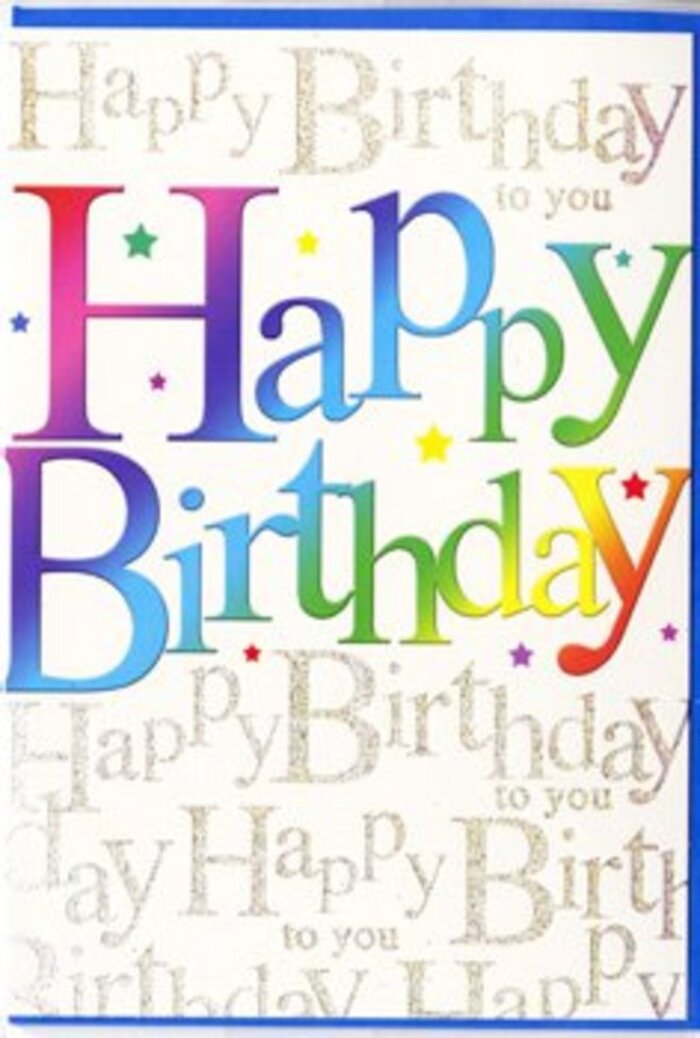 The birthday card shown here is a lively, contemporary design that seems to capture the happiness of a birthday morning in Berrylands, with sunlight streaming across the table and the kettle just boiled. The focal point is the phrase Happy Birthday, rendered in oversized, rounded letters that form a gentle curve across the card front. Each letter is filled with a velvety gradient of colour, flowing seamlessly from one shade to the next: cherry red slipping into fuchsia and coral, warm gold meeting lime green, teal dissolving into richer blues and purples. These transitions are smooth, more like watercolour washes than solid blocks, giving the impression of depth and movement, much as a florist blends colours across a bouquet of mixed stems. The letters themselves have a softness to their edges, a friendly, balloon-like profile that conveys light-hearted fun. Dotted playfully around the text are clusters of small, bright stars and specks, in tones that echo the rainbow lettering-tiny sparks of blue, yellow, pink, and green that look like confetti scattered across a party table. Behind all of this, the background remains pale and uncluttered but is covered in elegant lines of gold script, repeating Happy Birthday to you in a neat, looping hand. The metallic ink catches the light subtly, making the script appear almost like delicate ribbons threaded through the design. The card stock appears smooth, with a gentle sheen that enhances both the rainbow letters and the golden writing without creating glare. From the perspective of Berrylands Flowers, it is exactly the sort of birthday card that pairs beautifully with a colourful hand-tied bouquet delivered locally, perfect for celebrations in homes near Surbiton, Tolworth, or tucked away on a quiet Berrylands side street.