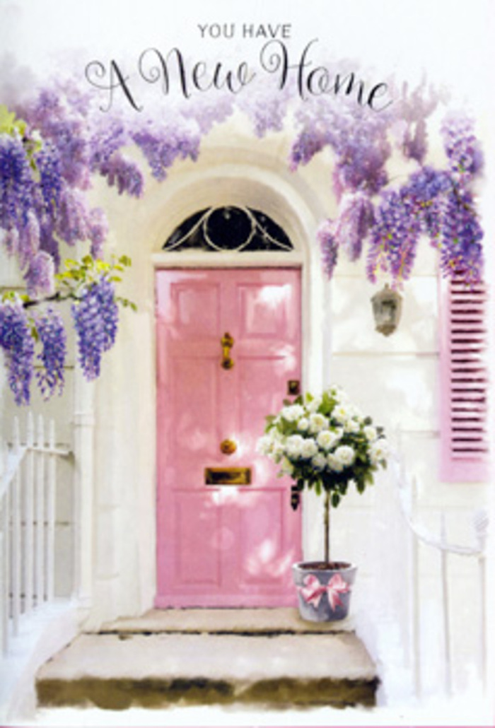 This image offers an intimate glimpse of a Berrylands entrance freshly adorned to mark a new chapter, with a pastel pink front door standing at the centre of a carefully framed floral vignette. The door itself is painted in a smooth, chalky pink, its colour softened by the daylight that filters through as if from a calm suburban street nearby. Flanking and arching over the door, generous clusters of wisteria spill in cascades of lavender blossoms, their racemes flowing downward like silky ribbons. Each flower contributes to a textured curtain of colour, and their imaginary fragrance seems to mingle with the gentle scent of roses below. The wall surrounding the door is whitewashed, with a pale shutter adding a discreet architectural detail that helps keep the mood light and airy. On the step at the threshold, a grey metal bucket sits proudly, brimming with a hand-arranged bouquet of white and cream roses. The roses are large, with soft, layered petals that open into rounded, almost cloud-like blooms. Nestled among them, sprigs of soft green foliage provide contrast and a feeling of freshness, the leaves' shapes adding a slightly wild, garden-picked touch. A delicate pink satin ribbon is tied around the base of the bucket, its bow simple yet refined, with gently trailing ends that rest on the stone step. The interaction of natural light, pastel tones, and cascading flowers creates an atmosphere of serene celebration, echoing the calm, friendly character of Berrylands. It is easy to imagine this being the sight that greets someone returning from a walk through local parks on the day they receive their keys, the arrangement offering a warm floral embrace to mark their arrival home.